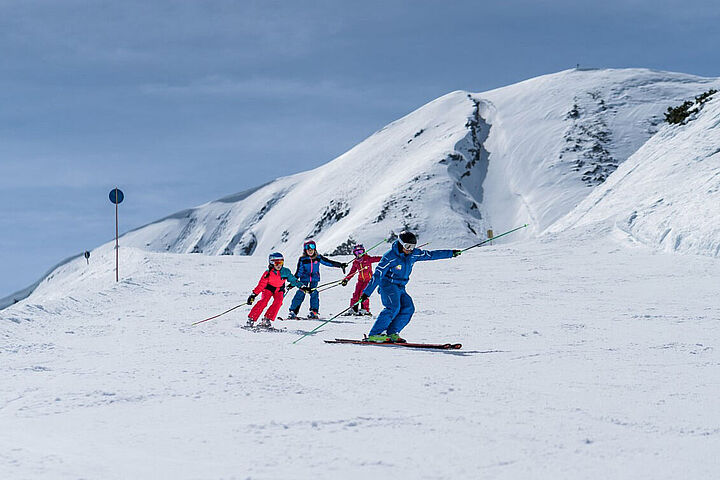 Ski group courses in Flachau - children's ski courses with the mascot Fischi