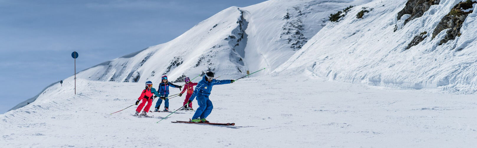 Skigroepcursussen in Flachau - kinderskicursussen met de mascotte Fischi